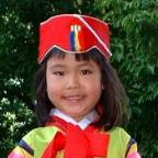Wearing the traditional Korean 'hanbok' dress (5 years)