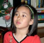 Opening up Christmas presents is always exciting (7� years)
